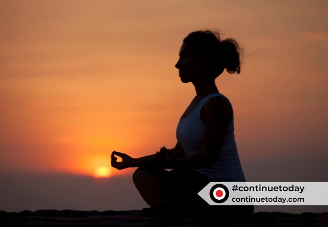 A girl is doing meditation