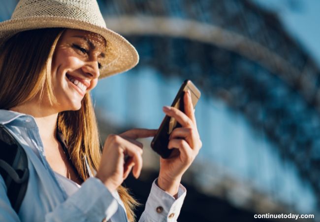 A girl is checking on her phone