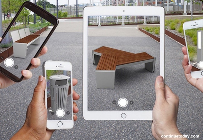 human hands holding devices for designing for context and the environment with AR