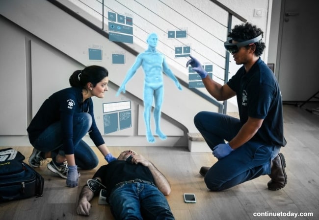 two people helping a man with AR as Emergencies and Rescue Efforts