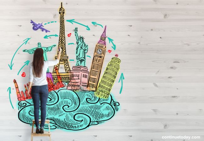 A girl is drawing on the wall