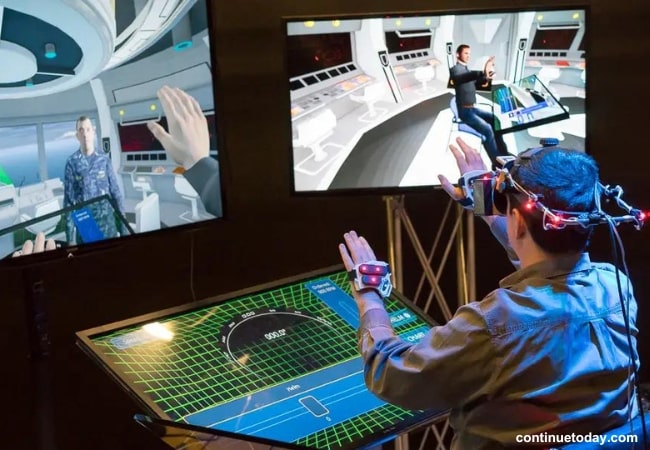 man using Extended Reality for Training other two people