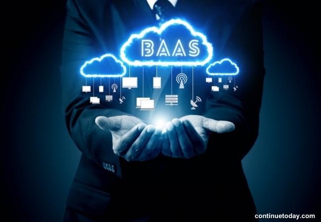 human hand holding BaaS (Mobile-Backend-as-a-Service)