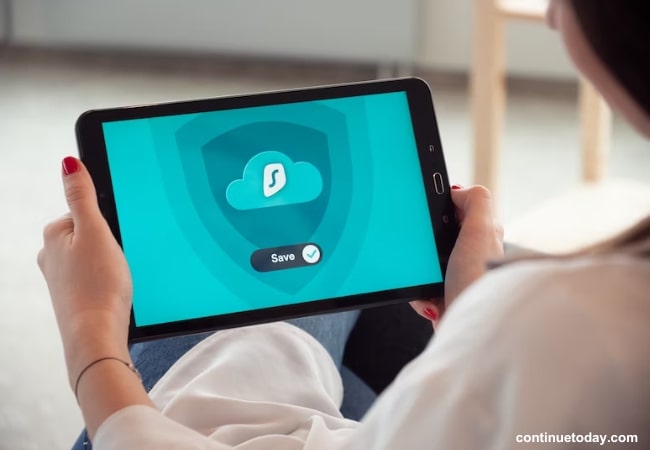 girl holding tablet with Endpoint Protection