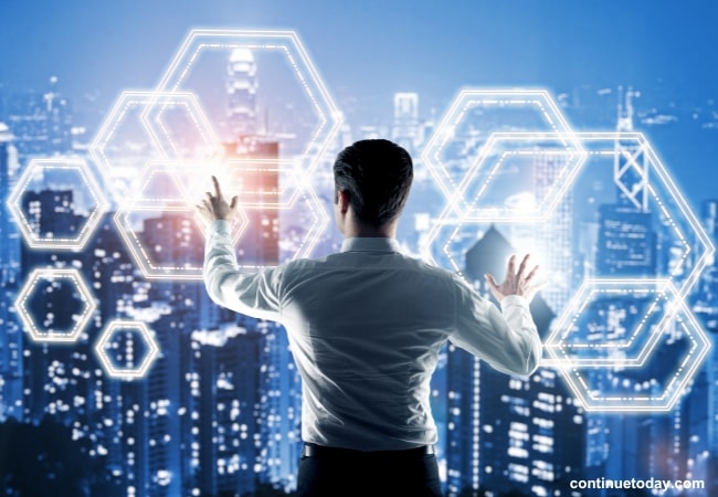 man managing security-related data and events on large screen  