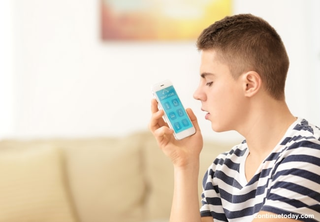 a boy using mobile for IoT