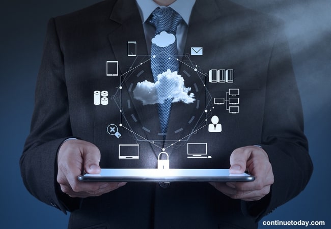 man holding tablet with Government Regulation elements for IoT Projects