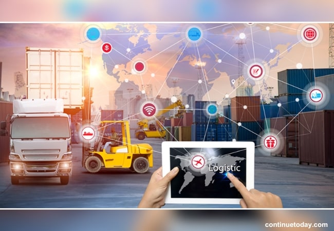 a hand holding tablet to operate IoT Projects in Logistics Management