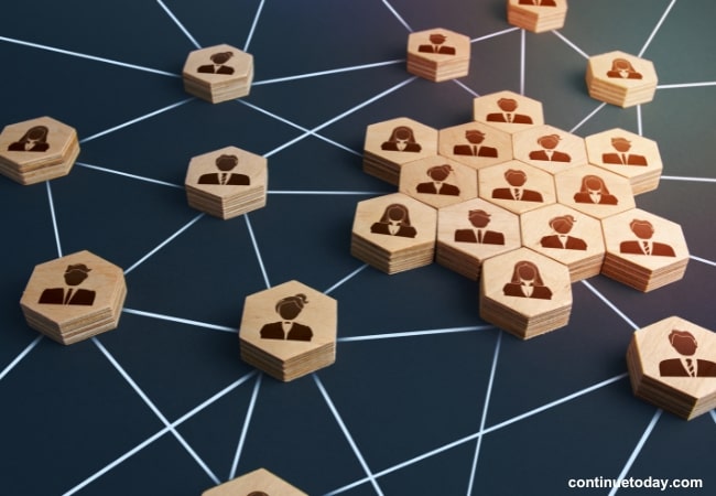 various blocks with individuals painting on it representing Medium Range Distance in IoT