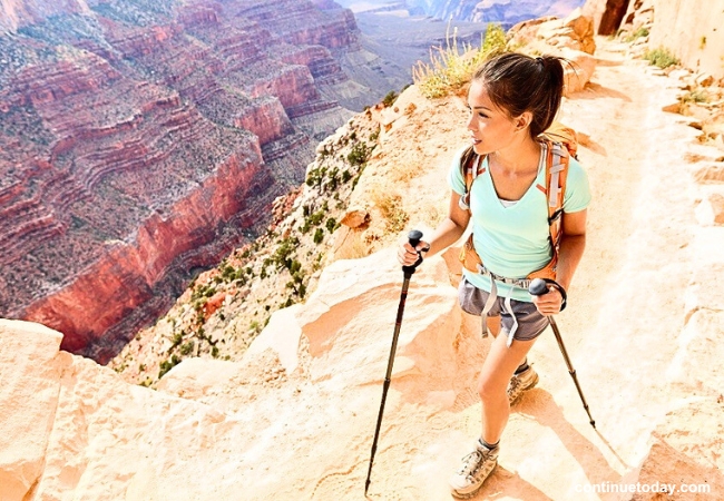 A girl is hiking at Grand Canyon